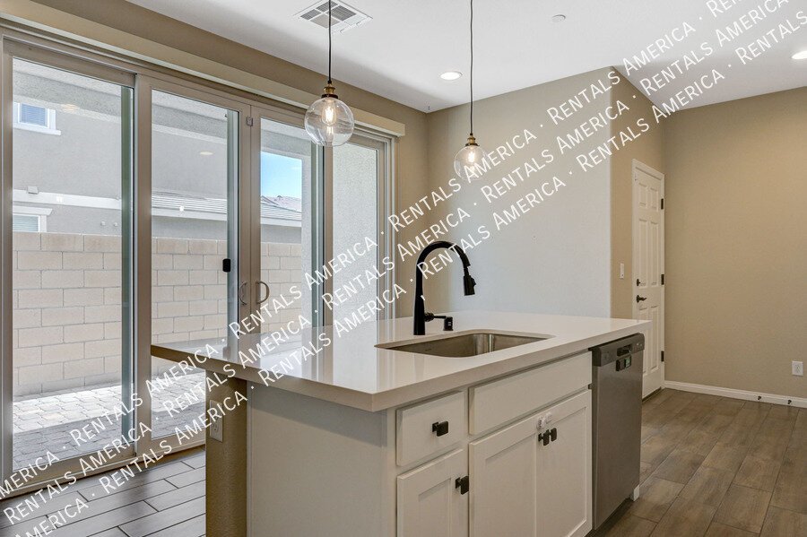 AVAILABLE NOW!! BEAUTIFUL *GATED* Designer Townhome in NLV! property image