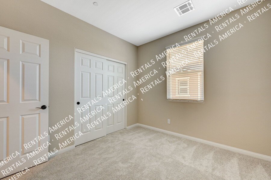 AVAILABLE NOW!! BEAUTIFUL *GATED* Designer Townhome in NLV! property image