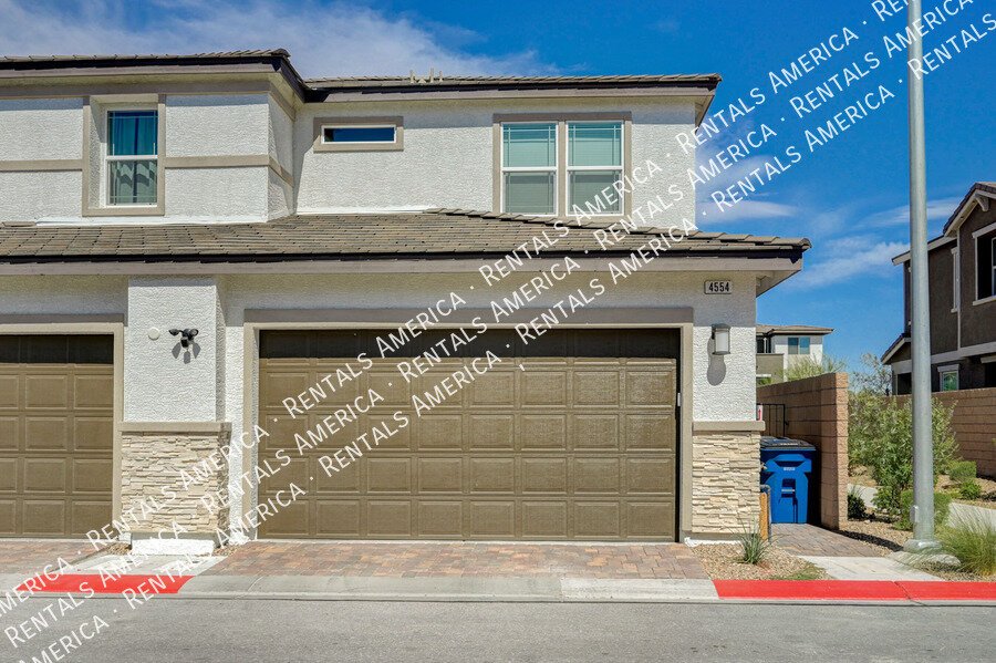 AVAILABLE NOW!! BEAUTIFUL *GATED* Designer Townhome in NLV! property image