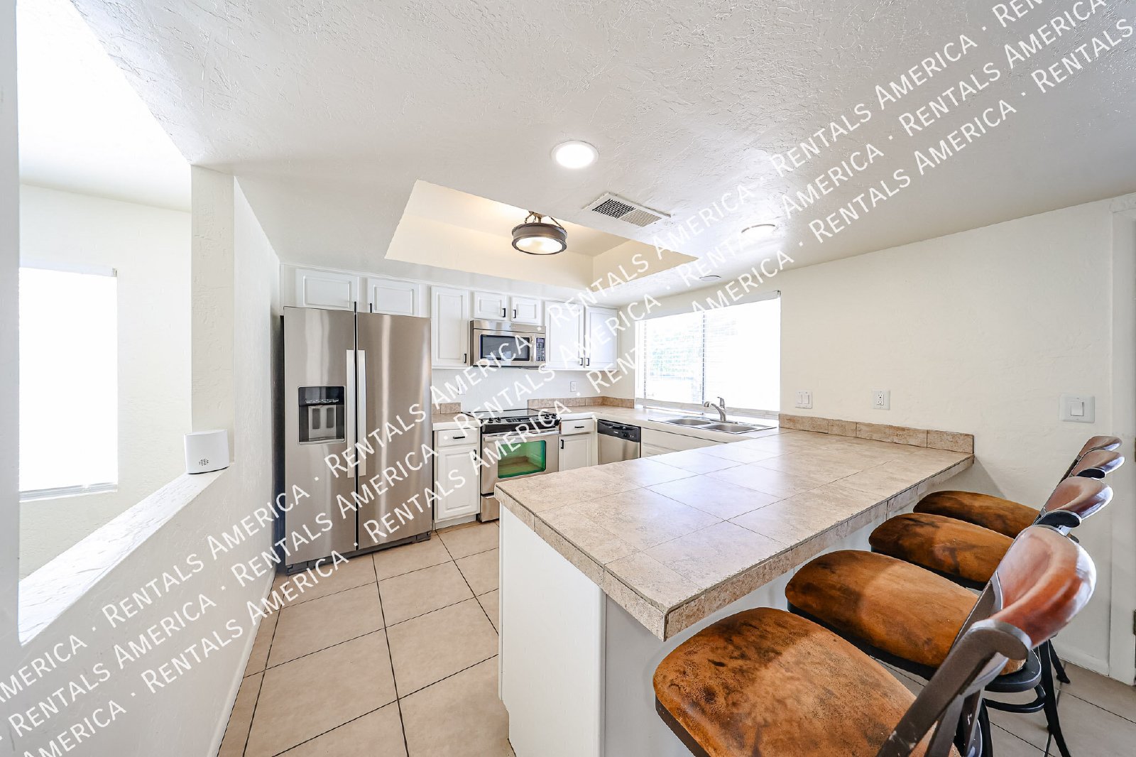 Spacious 4-Bedroom Townhome 2-Car Garage, Solar system, & Community Am property image
